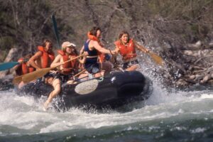 Rob Elliott in paddle raft in 1971