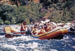 Sue Bassett rowing on the Stanislaus