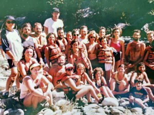 Photo of group of rafters on shore