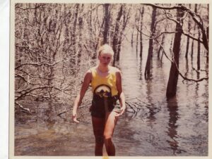 Susan at work in rising floodwaters