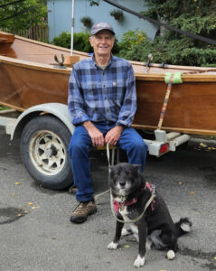 Mike Bronson in 2025 with dog, Socks